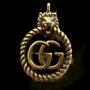 Beautiful Rare Gucci Antiqued GG Circle Lion Pendant will include a chain